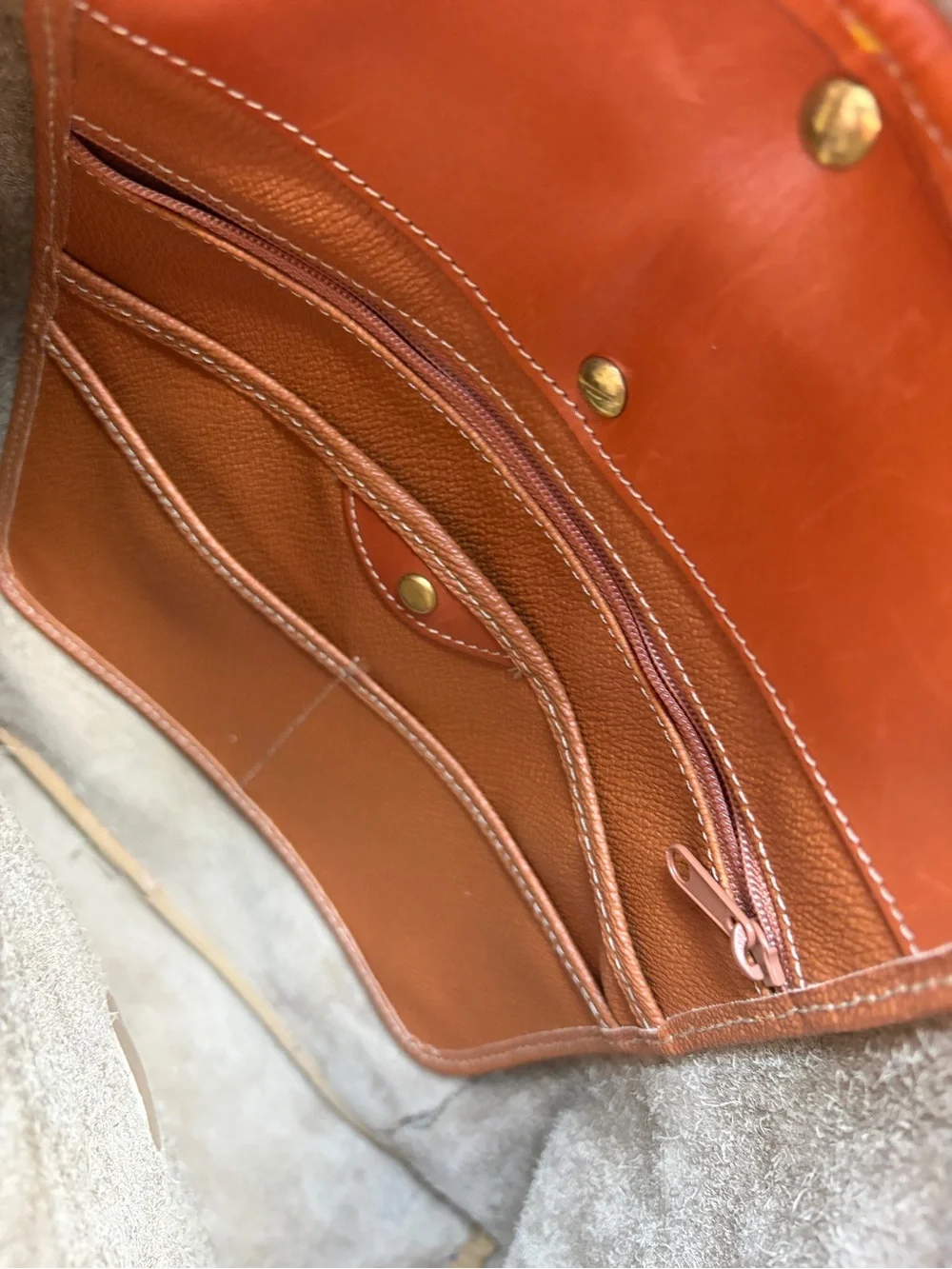 Dooney & Bourke Beige Leather Drawstring Backpack with Tan Trim